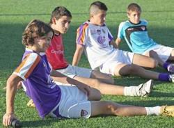 Niños de la Escuela del Deportivo Guadalajara durante unas sesiones de entrenamiento, la semana pasada, en los campos de césped artificial anexos al Pedro Escartín.