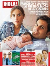 ¡HOLA!: Francisco y Lourdes en una tierna imagen junto a su hija Carmen.